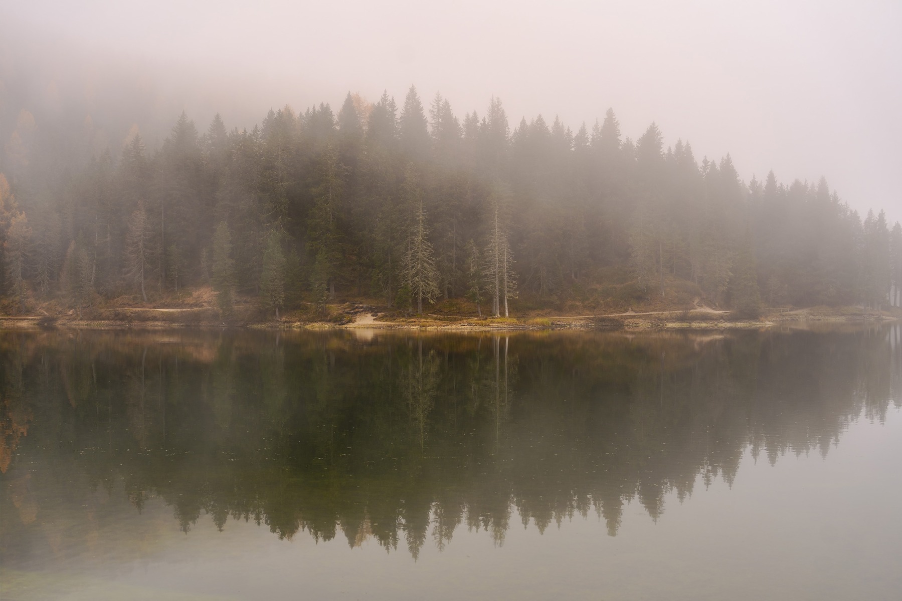fog-descending-on-a-still-lake