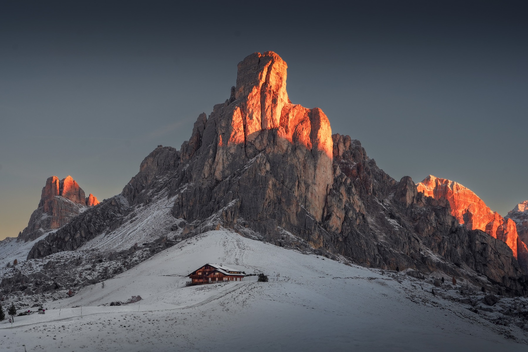 red-light-at-dusk-hitting-a-snowy-mountain