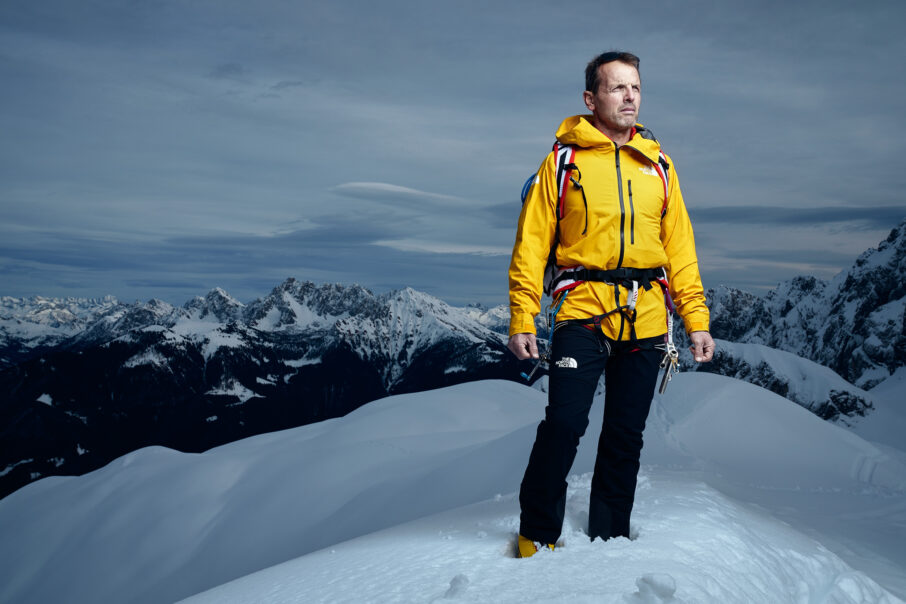 simone-moro-poses-atop-a-mountain_wresized_w906