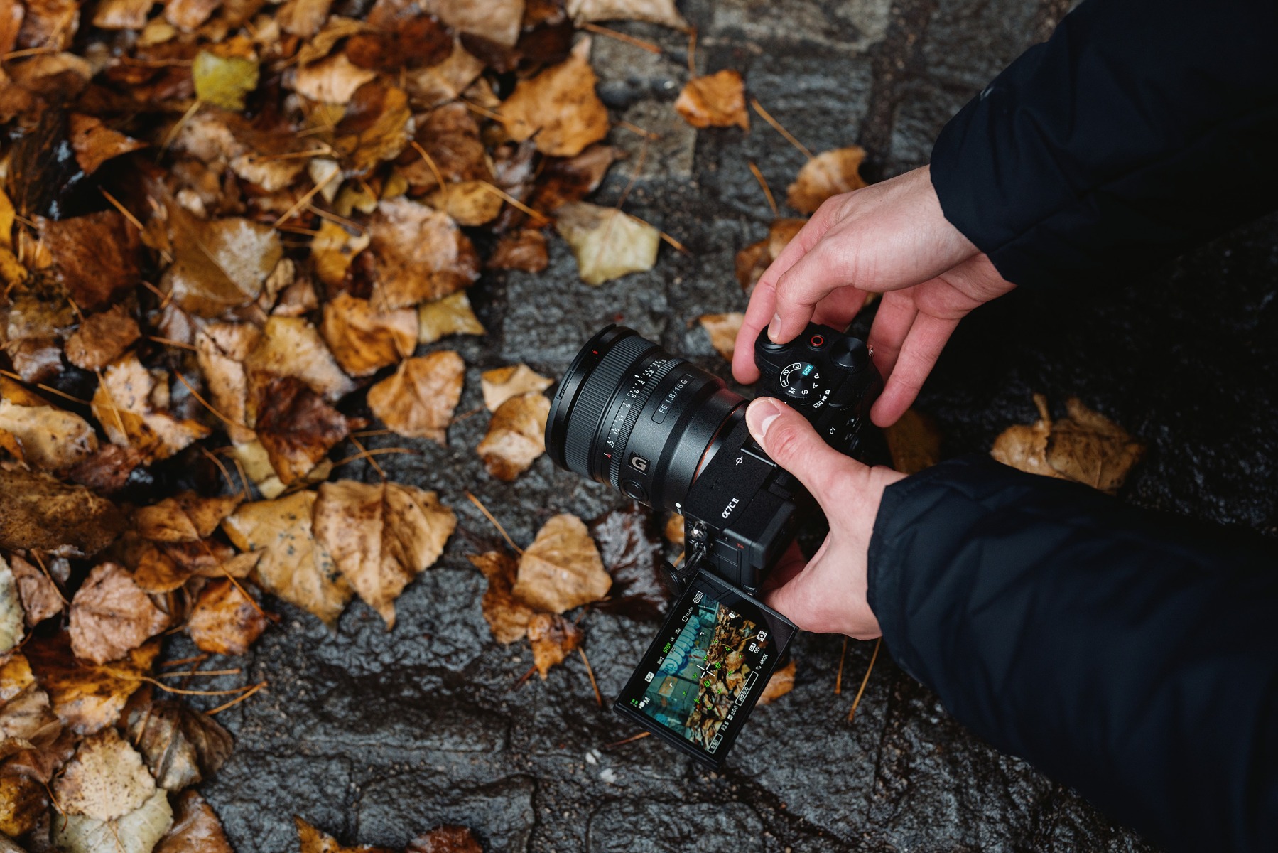 stefan-krenn-holding-his-sony-alpha-7cm2-with-the-fe-16mm-f18g-lens-attached